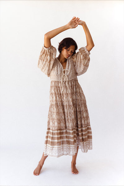 Daughters of India Jasmine Midi Dress in Shell — studio shot arms raised, flowing tiered skirt, hand screen print cotton