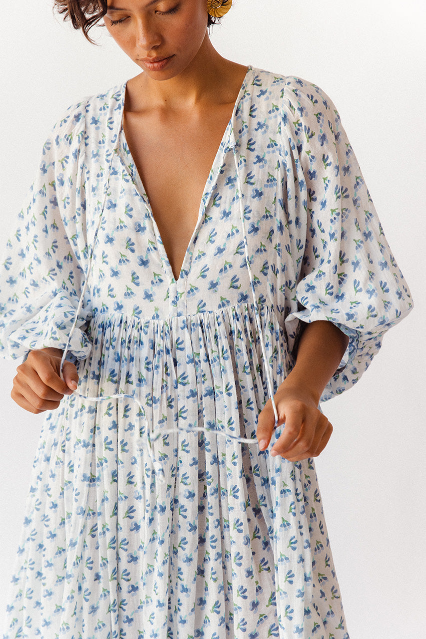 Daughters of India Kyra Maxi Dress in Azure — studio close-up V-neckline and gathered waist, blue floral block print